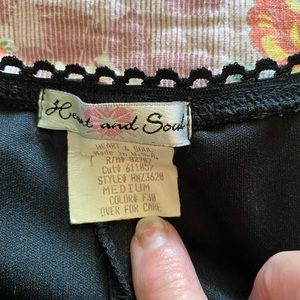HeartSoul black & floral skirt size medium but fits a small better.